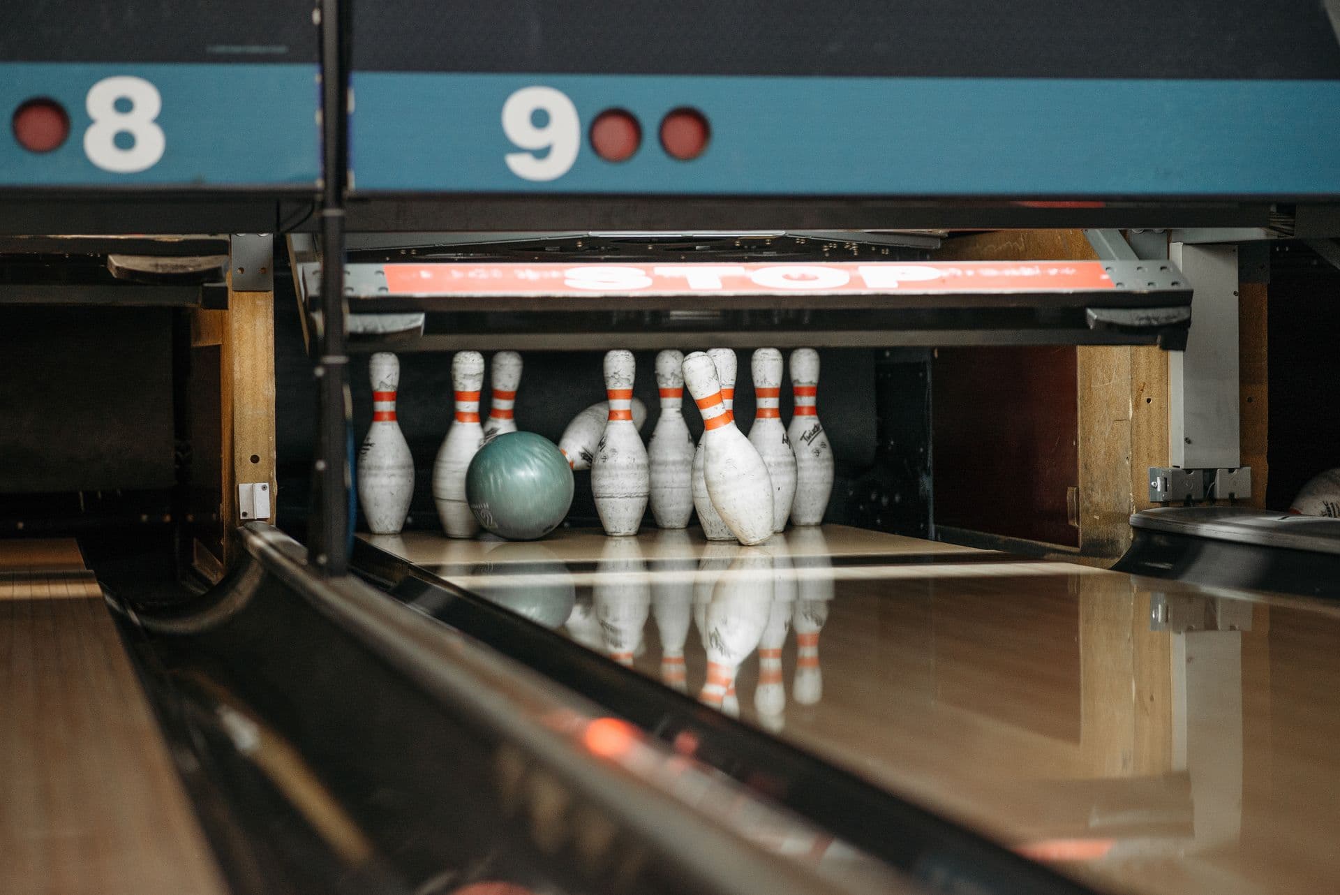 Bowling ball striking the pins